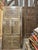 Elevate your home with this ornate vintage carved barn door, handcrafted from reclaimed wood and infused with old-world...