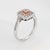 Stylish contemporary pink diamond square halo ring crafted in 14 karat white gold. Square cushion cut pink diamond is...