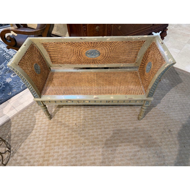 Bring immediate old-world European charm to your space with this remarkable "Bayonne" caned settee bench manufactured by...