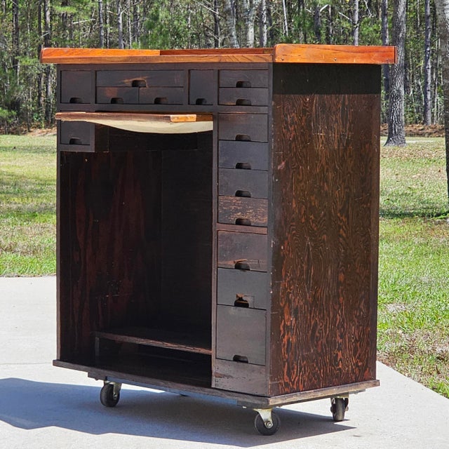 Own a piece of watchmaking history with this authentic antique watchmaker's bench by the esteemed J.H. Rosberg Mfg. Co. of...