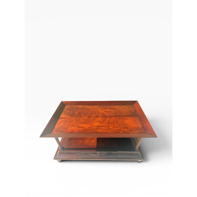 A refined and highly versatile coffee table by Baker Furniture, showcasing the brand’s signature craftsmanship and...