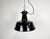 Industrial black enamel pendant light made in former Czechoslovakia during the 1960s. White enamel inside the shade. Cast...