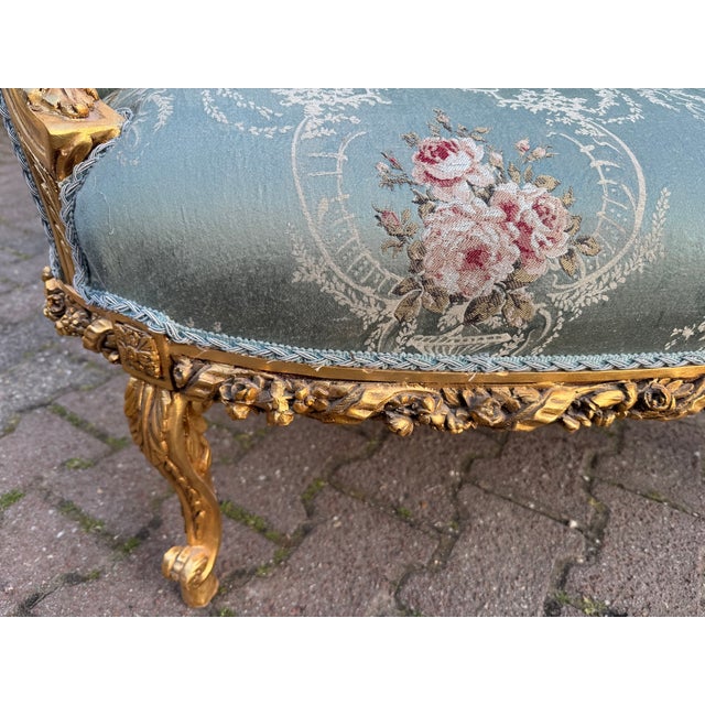 A beautifully decorative 1950 French Louis XVI-style settee, crafted from solid beechwood with an original patina antique...