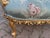 A beautifully decorative 1950 French Louis XVI-style settee, crafted from solid beechwood with an original patina antique...