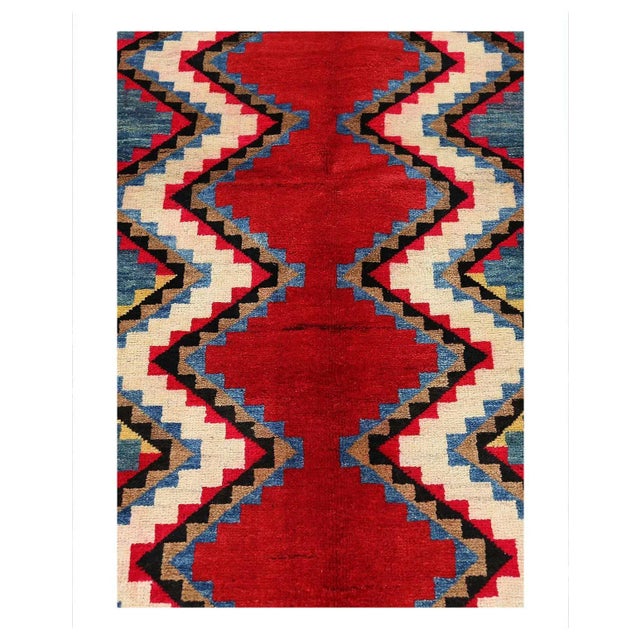 Vintage Persian Shiraz Rug, 3'4'' X 7'9''. A ruggedly enchanting tale unfolds in the embrace of this hand-knotted wool...