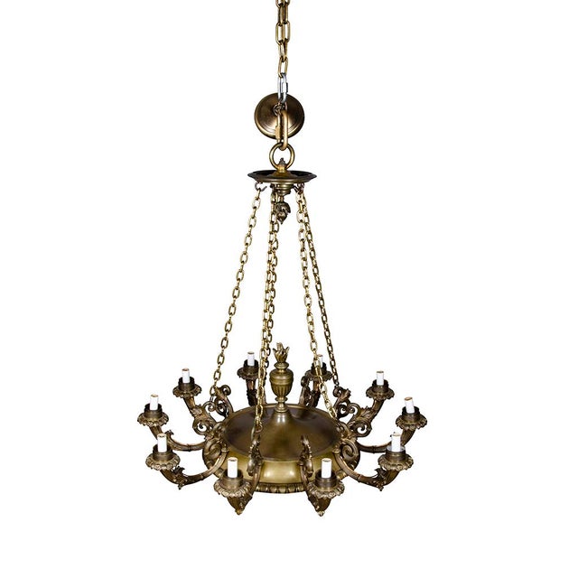 Empire Style Bronze Chandelier with ten arms with suspended chains. Electrified. Heavy gauge bronze. Possibly Caldwell....