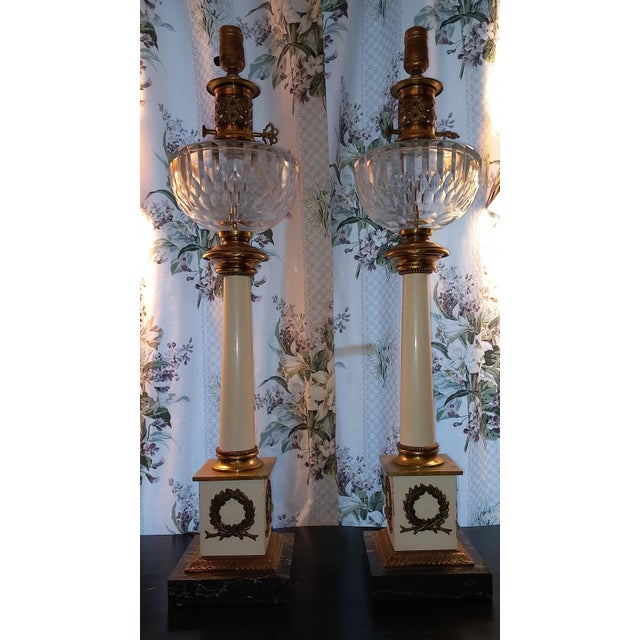 Large Pair of Empire style oil lamps. In very good condition, except for a small accident to a fixing ring (visible in the...
