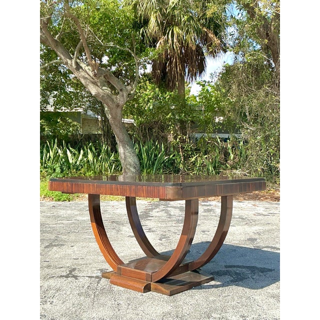 This stunning vintage Deco zebrawood center hall table is a masterpiece of timeless elegance and craftsmanship. Featuring...
