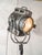 A 1950s arri 2kw fresnel film spotlight, reworked into an adjustable floor lamp on a rolling tripod stand. arri, founded...