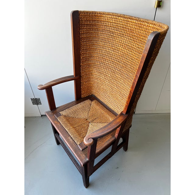 With woven straw back and wood and rush seat. Square legs.