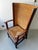 With woven straw back and wood and rush seat. Square legs.