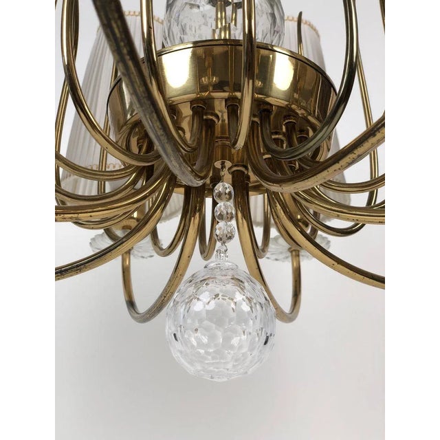 Elegant chandelier from austrian producer j. L. Lobmeyr with 8 arms, crystal elements and original shades in white silk....