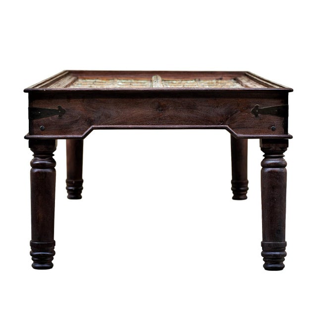 Step into a room anchored by a story of heritage and artisanal mastery. Our 83 Inch Antique Repurposed Door Dining Table...