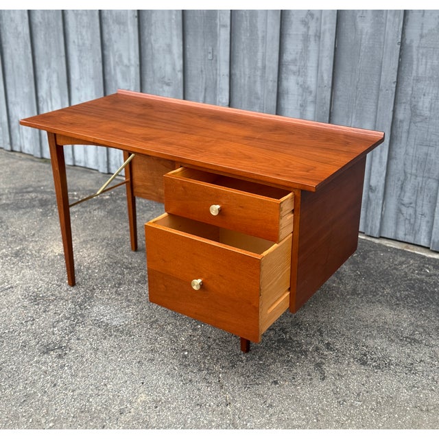 Mid-Century Solid Walnut Desk with Brass Stretchers & Polished Brass Pulls – Newly Restored A beautifully restored mid-...