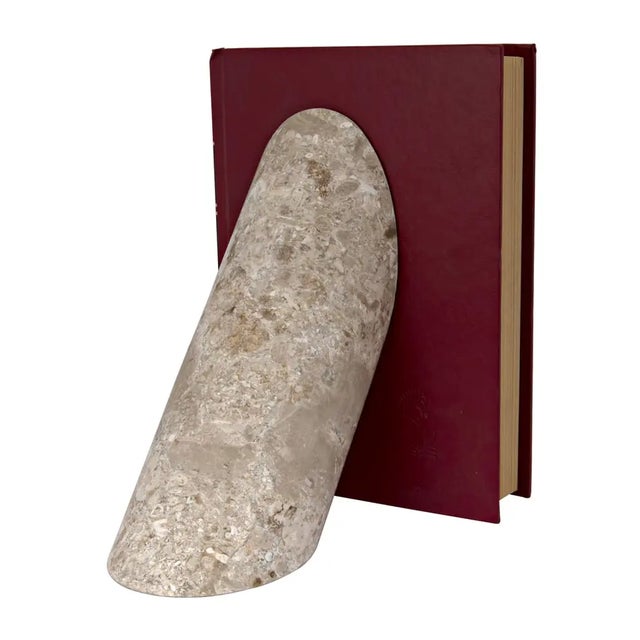 The Architectural Bookends are a testament to the fusion of elegance and practicality. Crafted from high-quality marble,...