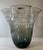 Admire the exquisite craftsmanship of this hand-blown art glass vase. Its design features an asymmetrical flared ruffled...