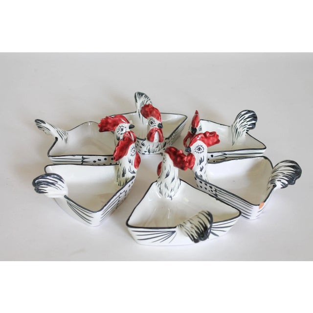 Set of six ceramic triangular hand painted rooster bowls. Several are marked "Italy" and numbered. Several chips noted and...