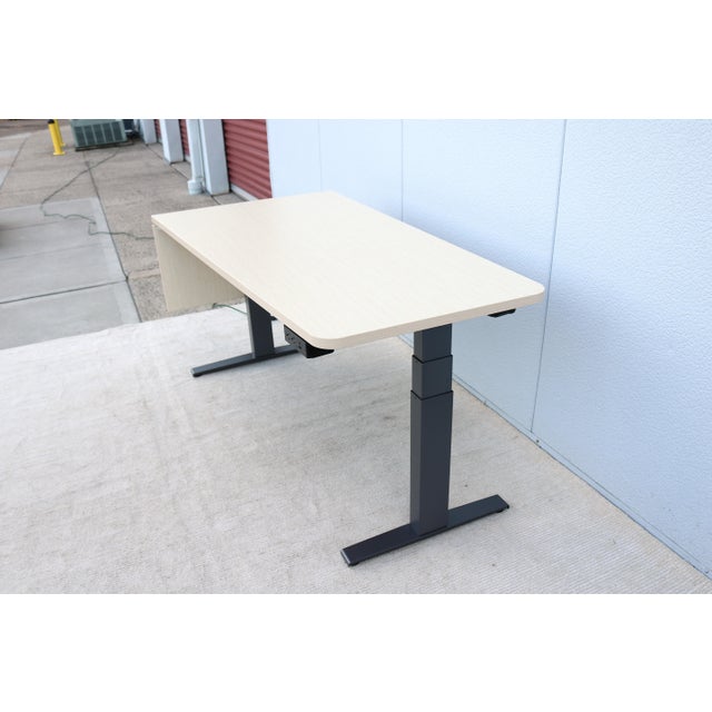 Elegant Motia Ergonomic Sit-to-Stand table desk/work center by Herman Miller. Electric adjustable height work table that...