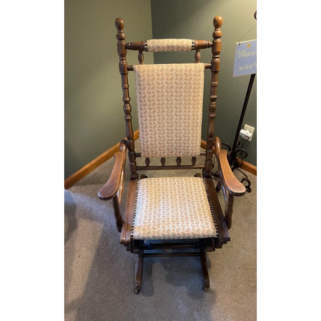 An exceptional 19th-century Wakefield platform rocking chair, beautifully crafted and remarkably preserved. This antique...
