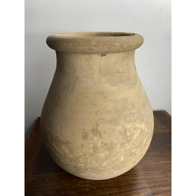 Magnificent terracotta jar. Handcrafted by a Provençal potter in Biot, Southern France. Marked on the front. In excellent...