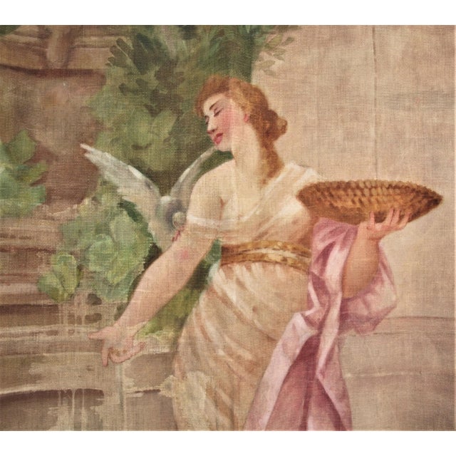 An antique hand painted hanging tapestry of an alluring woman feeding birds. Material appears to be a layer cotton....