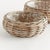 Woven by hand in a thick Kubu rattan that is claydyed & dried in the sun, these sturdy low basket planters are the epitome...
