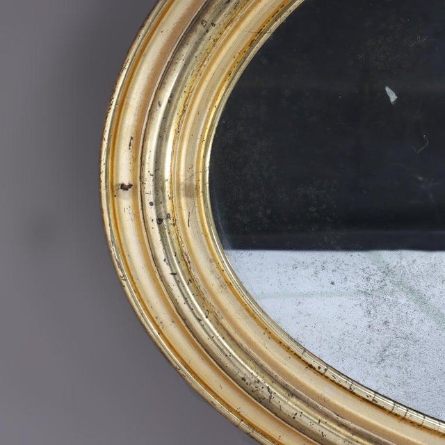 Antique Federal Period Lemon Gilt Wood Oval Wall Mirror C1830 Measures - 25 3/4" x 45 1/4" x 2 1/2" A fine example of...