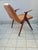 1950s teak armchair designed by architects and designers Lietti and Motta. Produced by Gaetano and Alessandro Besana...