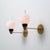 Pair of italian wall sconces dating from the 1950s, featuring a refined mid-century modern design with a clean horizontal...