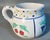 Made to surprise and delight, this hand decorated sugar with lid bowl & creamer set is just plain cutesie cool. Adorned...