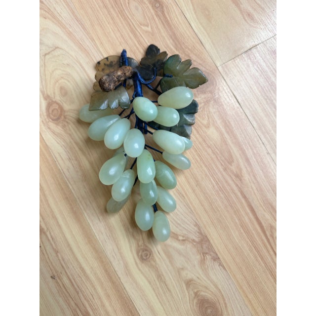 Perfect coffee table piece; right on top of a gorgeous book. This piece is gorgeous. One grape has been damaged on the...