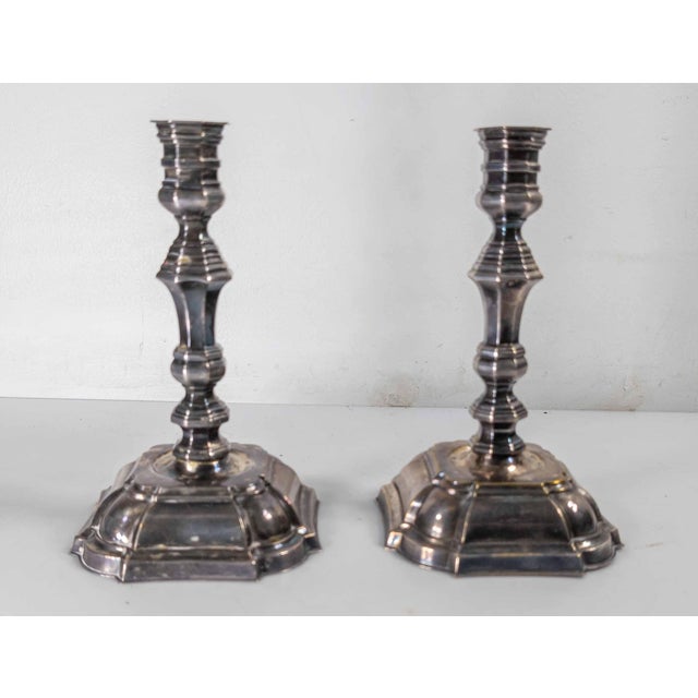 We are selling this pretty pair of Danish George II style candlesticks. These candlesticks have great form but are Danish...