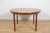 This round extendable dining table was produced by McIntosh in the 1960s. Teak elements cleaned from the old surface and...