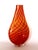 The handblown glass bottle in a tall, flattened, tapering shape with gently flared mouth and rounded lower body is...