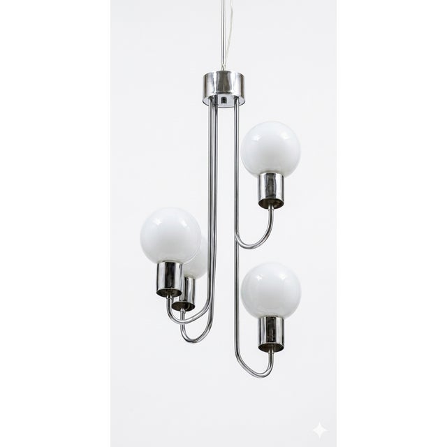 ​ Design elements: The curved chrome arms, the cascading effect Up to 250V (Europe/UK Standard).The wiring of this item...