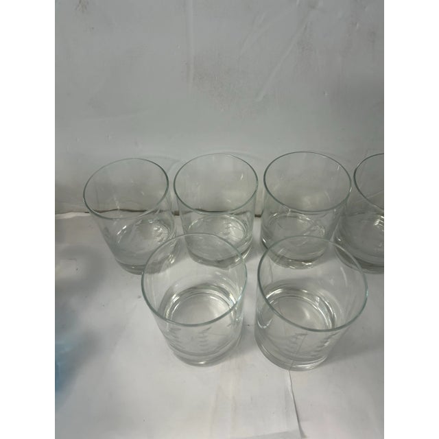 Beautiful set of heavy clear glasses with an etched ship detail. Perfect for that seafarer or boat aficionado.