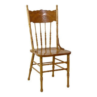 Late 20th Century Vintage Symmetrical Swirls Pressed Back Wooden Dining Chair For Sale
