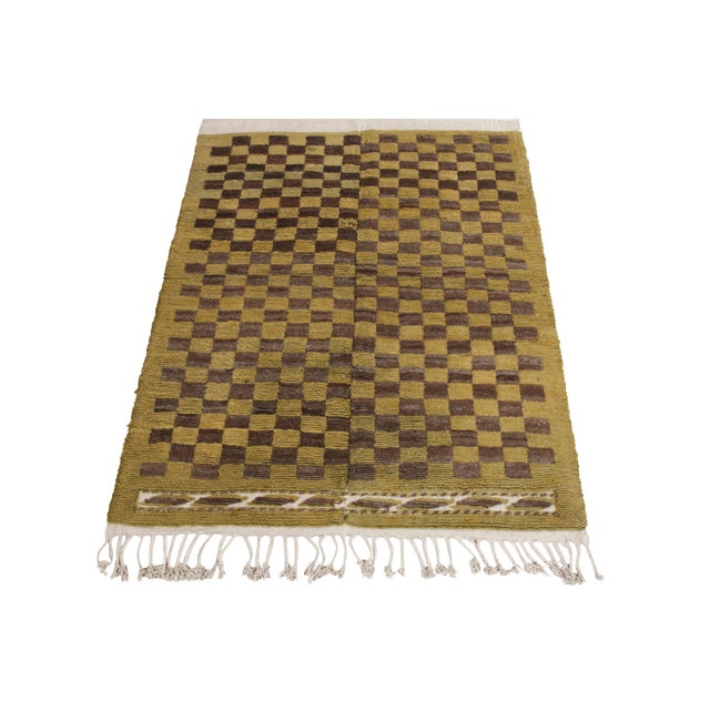 Hand-knotted in wool, a 4X6 vintage Tulu rug originating from Turkey circa 1950-1960, now joining Rug & Kilim’s Antique &...