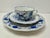This authentic 3-piece porcelain place setting (trio) features the iconic Blue Onion (Zwiebelmuster) pattern, crafted by...