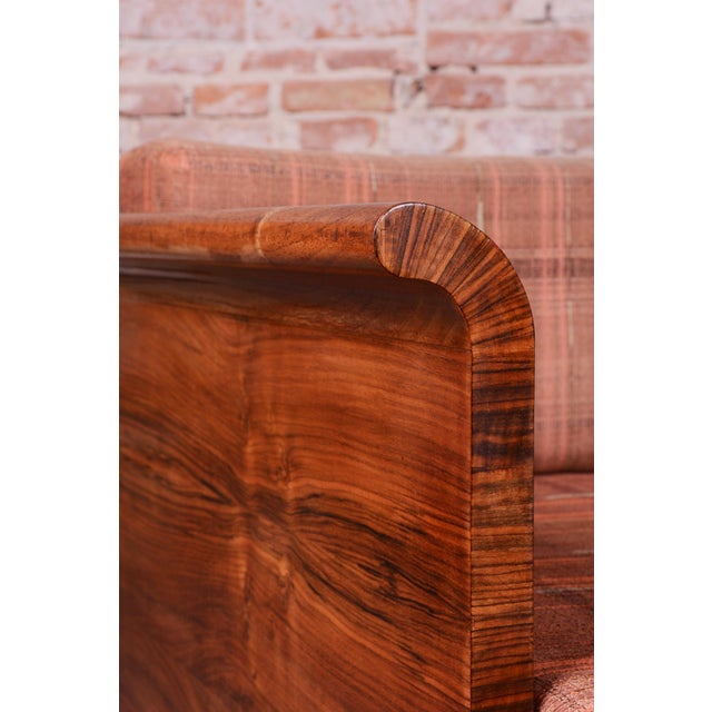 This exclusive sofa represents one of the most iconic designs of czechoslovak interwar furniture. It is the model h 162, a...