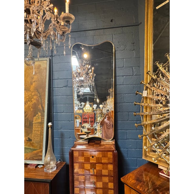 The Italian Shaped Brass Mirror is a stylish and elegant addition to any home décor. The intricate design and...