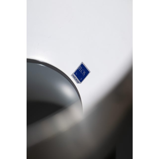 The iconic arco lamp, designed by achille castiglioni and pier giacomo castiglioni for flos in 1962. A true icon of 20th-...