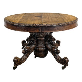 Renaissance-Style Oak Pedestal Table with Dragon Heads For Sale