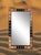 Large eye catching rectangular wall mirror from Morocco. Hand made with cut and hammered silver alloy metal embellishments...