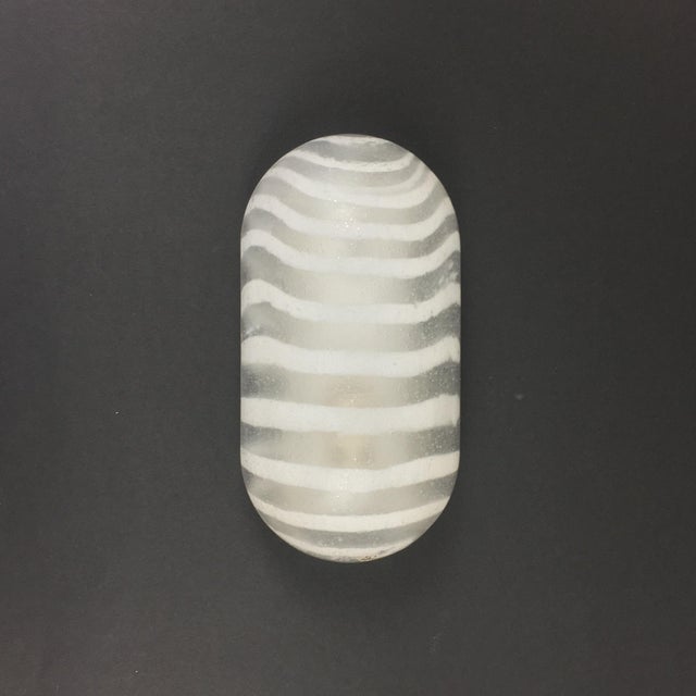 Stunning pair of striped glass wall lights from peill & putzler (germany, 1970s). High quality hand blown thick frosted...