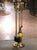 Place this elegant antique fireplace tool set next to your mantel. Crafted in France circa 2000 and built of brass and...