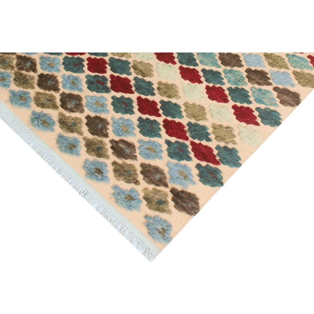 Make a statement in your home with this meticulously hand-knotted high-low pile Moroccan wool rug. An intricate design...