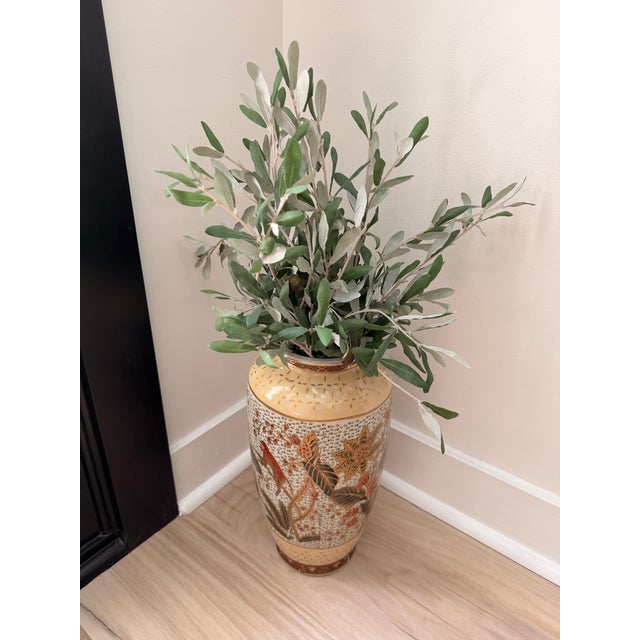Beautiful vintage Asian-style ceramic floor vase featuring an intricate hand-painted design with a monkey perched among...