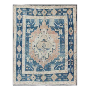 Mid 20th Century Blue and Salmon Vintage Turkish Oushak Rug With Layered Medallion and Motifs