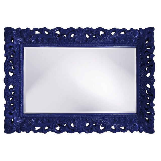 The Barcelona Mirror features an ornate rectangle frame complete with scrolls and flourishes. It is then finished in our...